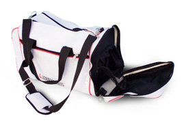 Our gym bags feature a 'shoe sleeve' to keep your athletic apparell separate from your shoes. The multi-function zippered end-compartment has a zippered net access to the shoe sleeve that runs the length of the bottom of the duffel-bag. Easily fits Size 13 shoes!